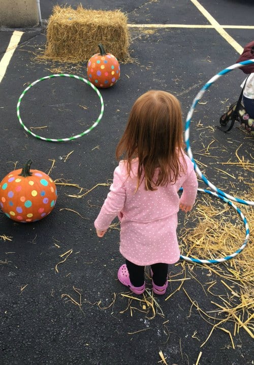 pumpkin toss - halloween party games for kids