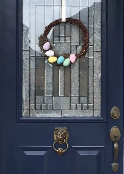 DIY Easter wreath using items from the dollar store. Dollartree easy Easter egg wreath