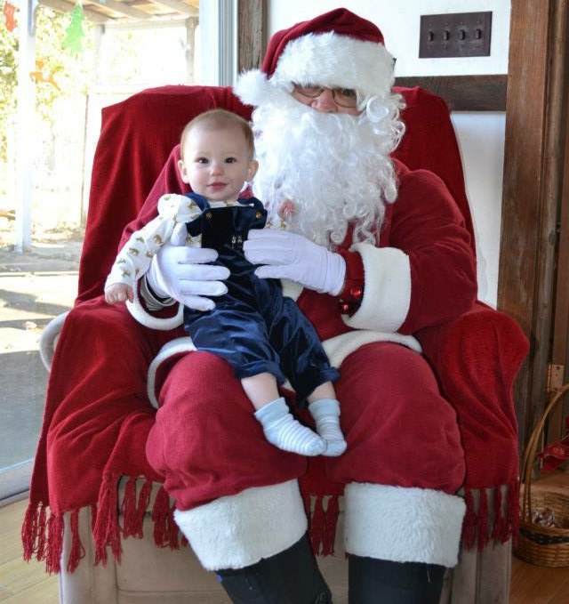 baby's first Christmas photo with Santa