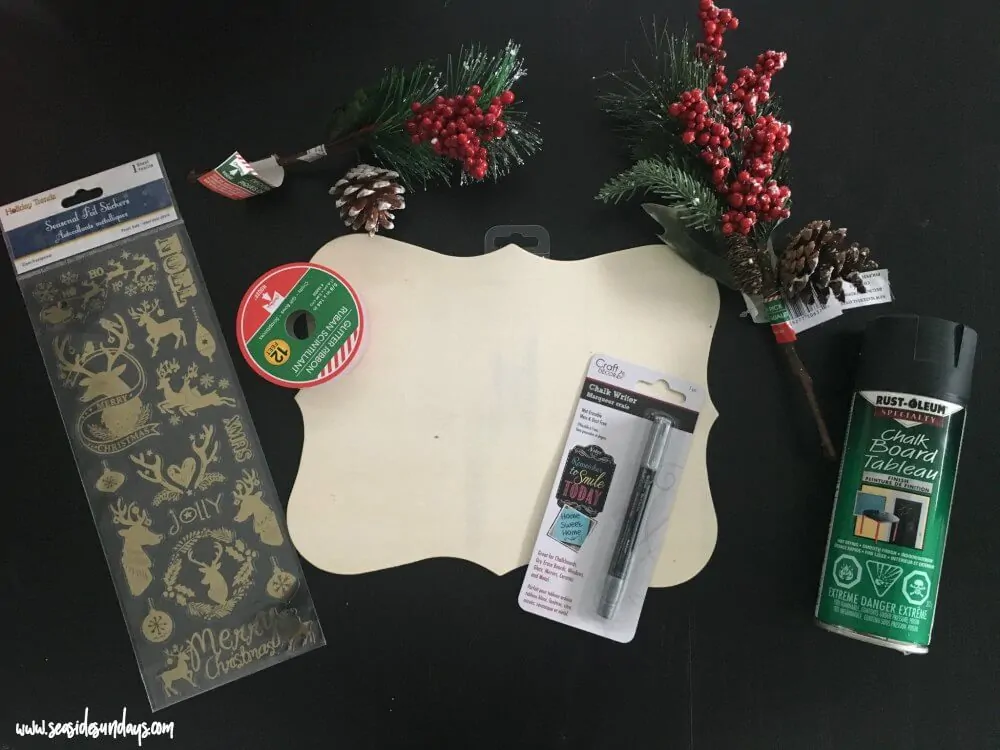 Chalkboard sign tutorial - how to make your own chalkboard sign using dollar store materials. These signs are cute for the holidays or as home decor all year long. You can make this sign in less than 30 minutes. Great for Christmas or fall decor. 