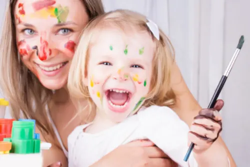 mother and girl doing crafts together