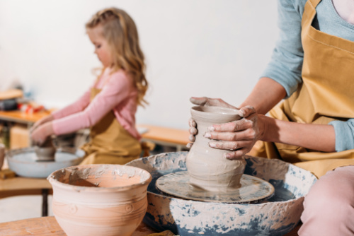 mother daughter group activities such as pottery are fun