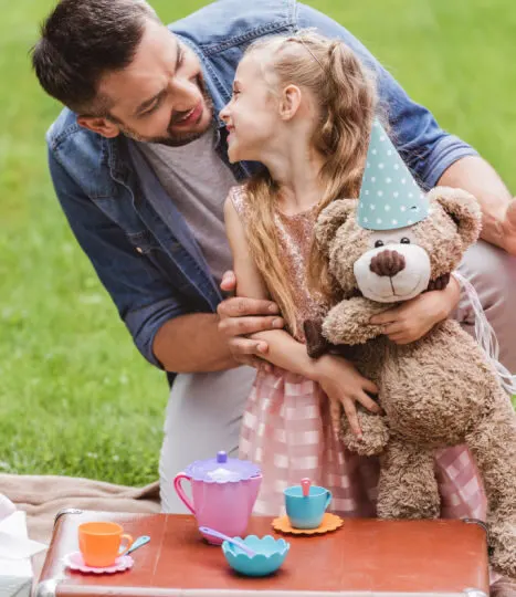 Teddy bear's picnic for father and daughter