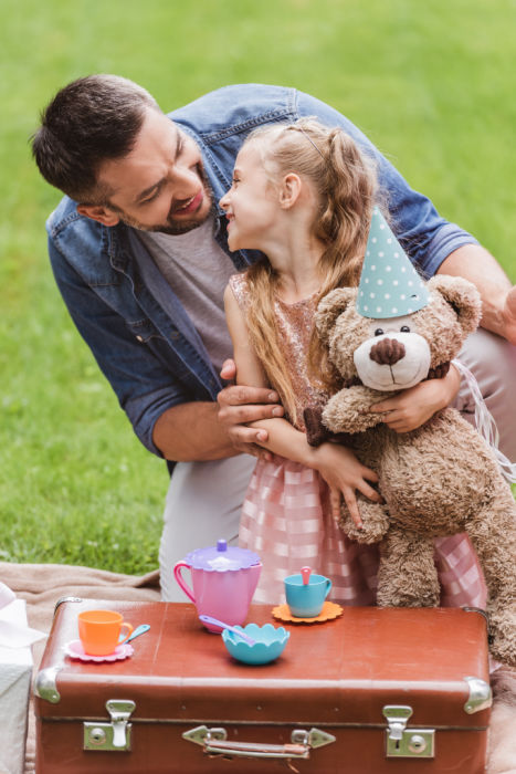 Teddy bear's picnic for father and daughter