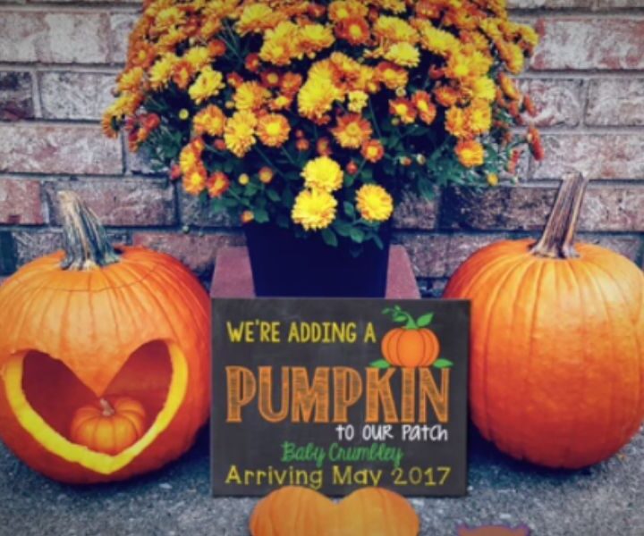Baby pumpkin fall pregnancy announcement 