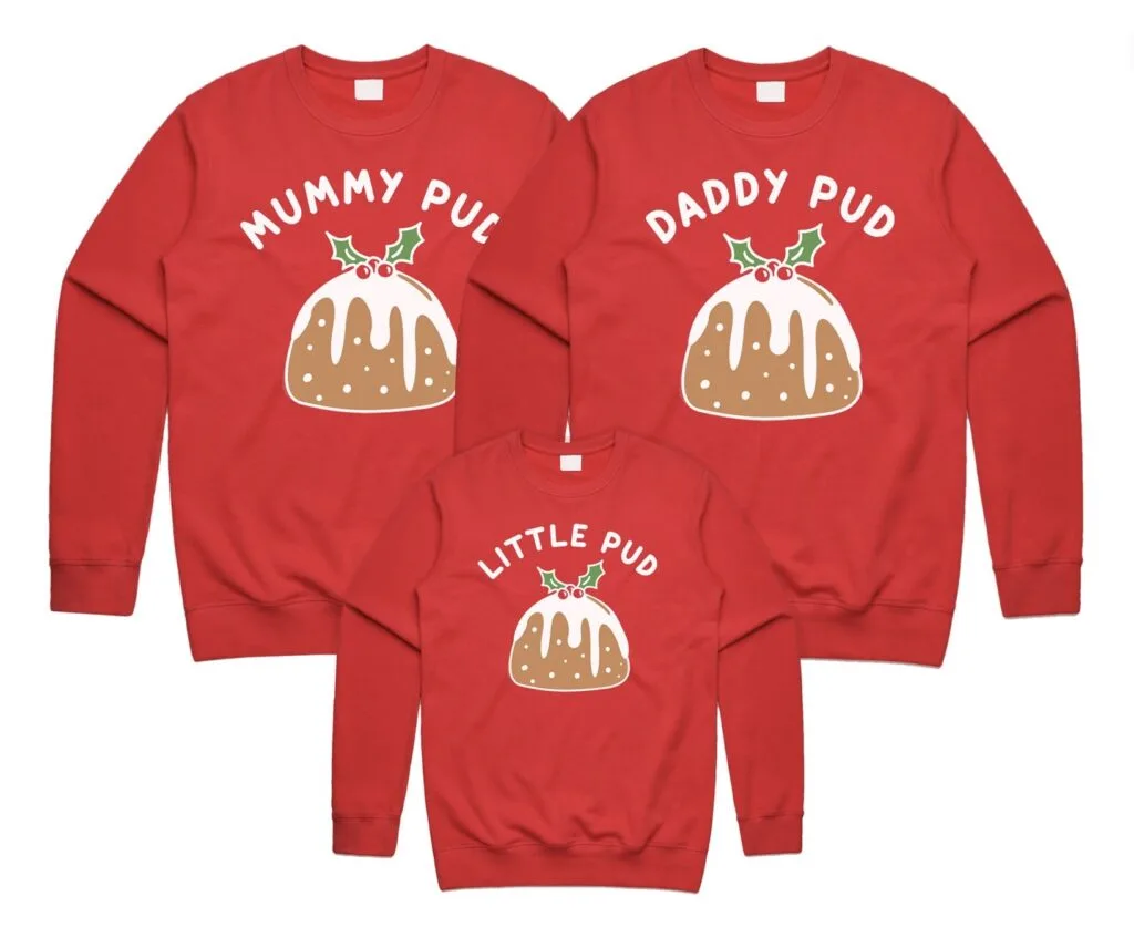 Matching mom and dad Christmas pudding sweaters