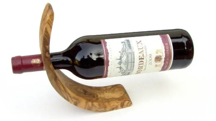 gifts for single moms - wine and a wine holder made of olive wood.