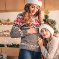 sibling Christmas pregnancy announcement